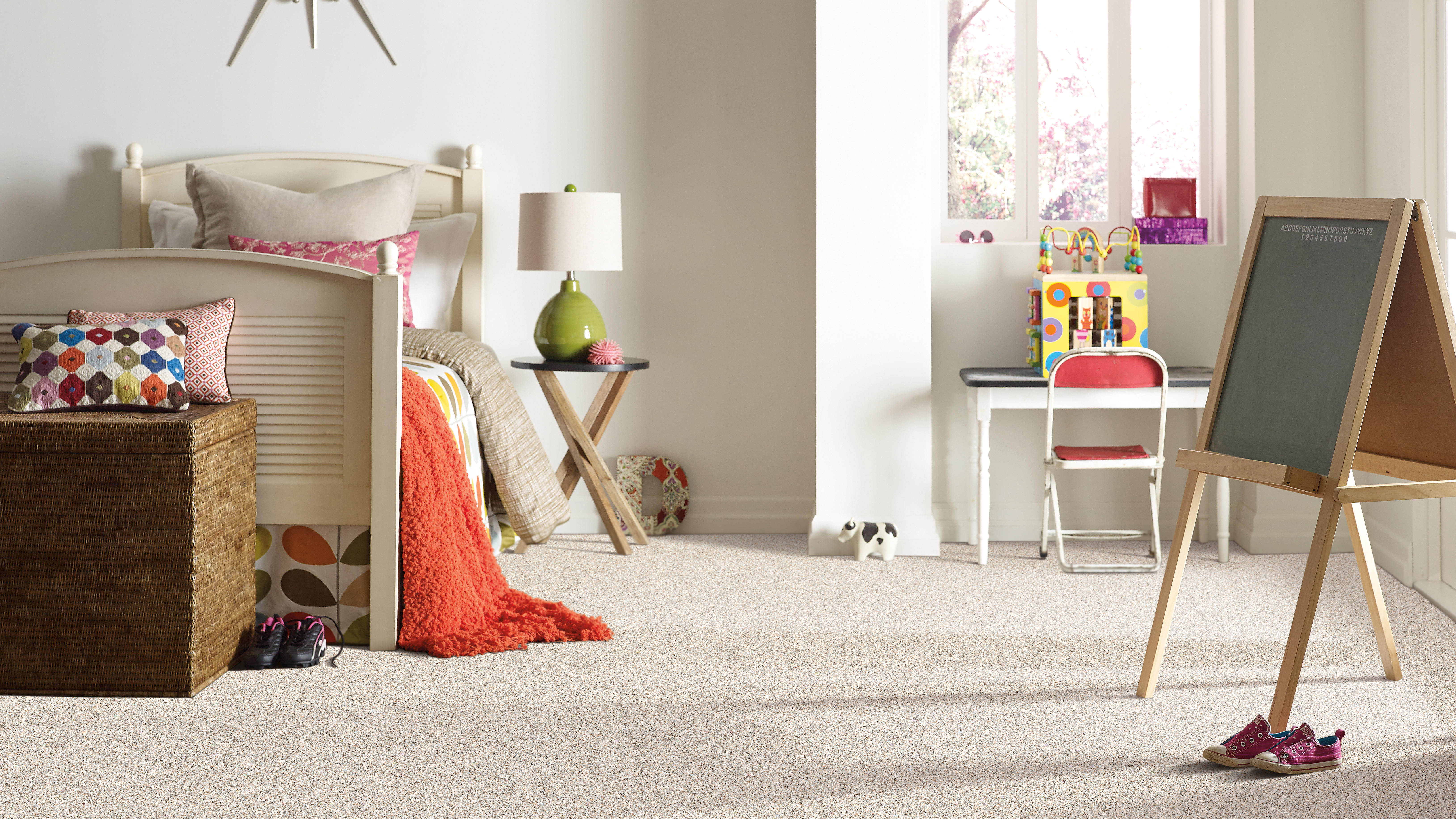 Carpet in a kid's bedroom, installation services available.